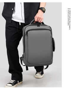 Close-up of waterproof dark gray business backpack with side handle for versatile carrying