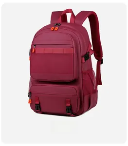 Detail of red laptop backpack with mesh pocket, orange zippers and durable buckle