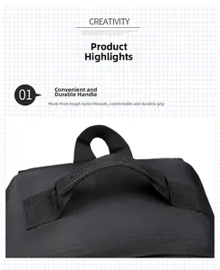 Detail of reinforced nylon handle and woven strap on the black hiking backpack top