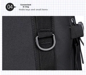 Detail of durable metal D-ring on reinforced nylon strap of the black travel backpack