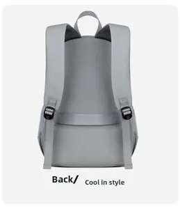 Back view of gray backpack featuring breathable straps and a luggage trolley sleeve