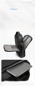 Detail view of business backpack interior showing laptop compartment and storage pockets