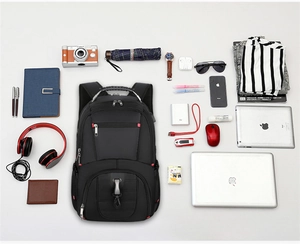 Vista plana de mochila de negocios negra mostrando gran capacidad para laptop y accesorios