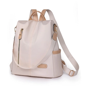 Minimalist beige nylon backpack for women with anti-theft design and gold hardware