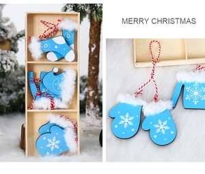 Detailed close-up of blue wooden Christmas ornaments with white snowflake patterns and fur trim