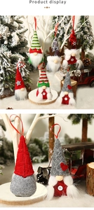 Detail of Christmas gnomes with elf hats and antlers for holiday tree decorations