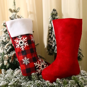 Christmas stocking set with red and black plaid snowflake patterns and plush fur cuffs