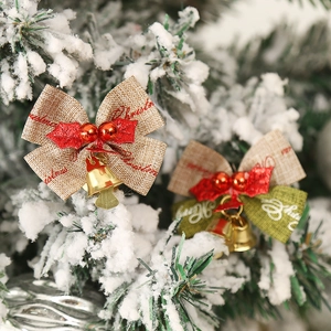 Handmade burlap Christmas bows with bells and holly for festive tree and gift box decor