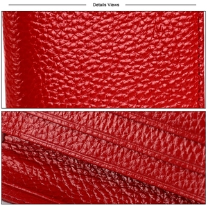 Détail de la texture en cuir véritable rouge et coutures précises du porte-cartes RFID en cuir