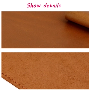 Détail de la texture du cuir crazy horse avec coutures de précision et envers en suède