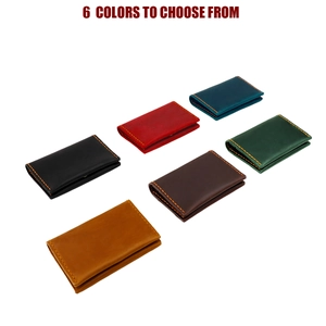 Close-up of genuine leather card holders in six colors with contrast stitching details
