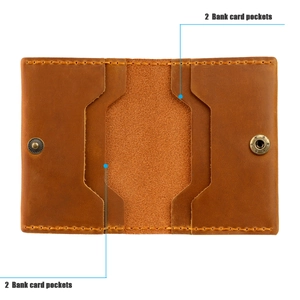Detail view of crazy horse leather wallet interior with four symmetrical bank card pockets