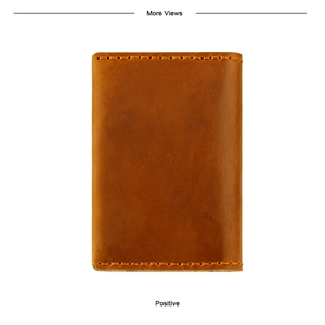 Front view of a brown genuine leather vertical card holder with contrast stitching details