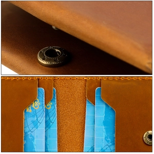 Macro detail of crazy horse leather card wallet with star snap button and precision stitching