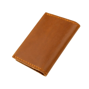 Deep brown genuine crazy horse leather card wallet with orange contrast stitching
