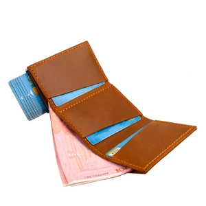 Macro detail of brown crazy horse leather wallet with multi-card slots and cash compartment
