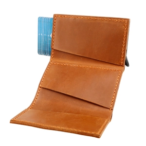 Detail view of brown crazy horse leather wallet showing three card slots and stitching