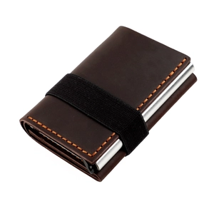 Detail of crazy horse leather wallet with orange stitching and pop-up aluminum card holder