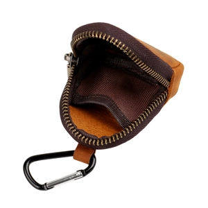 Detail view of crazy horse leather coin purse showing interior lining and metal carabiner