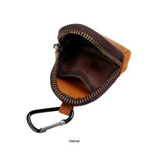 Internal view of a vintage triangle leather coin purse with brown lining and metal zipper