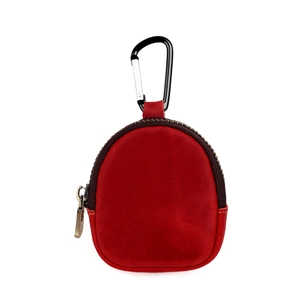 Macro shot of red crazy horse leather coin purse with zipper and metal carabiner