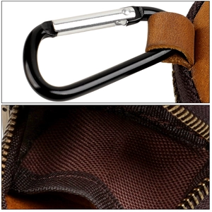 Detail of brown crazy horse leather pouch with vintage metal zipper and inner lining