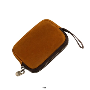 Side view of vintage crazy horse leather coin purse with bronze zipper and hand strap