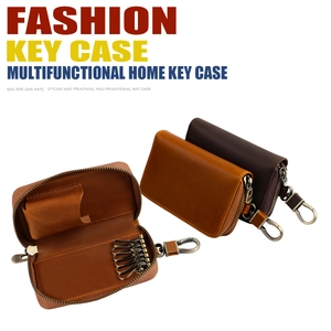 Detailed interior of vintage crazy horse leather car key case with multiple metal hooks