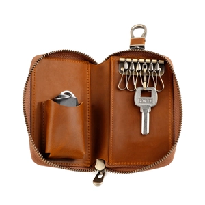 Internal view of vintage crazy horse leather car key case with six metal hooks and pouch