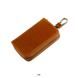 Side view of vintage brown crazy horse leather car key case with zipper and bronze hook