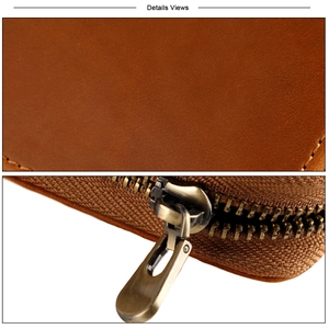 Macro view of vintage brown crazy horse leather texture and bronze metal zipper details