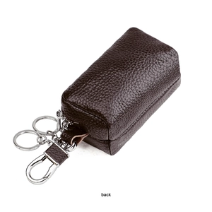 Rear view of dark brown pebbled leather car key case with silver metal hardware