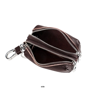 Detail shot of a dark brown pebble leather car key case with double zippers and metal hooks