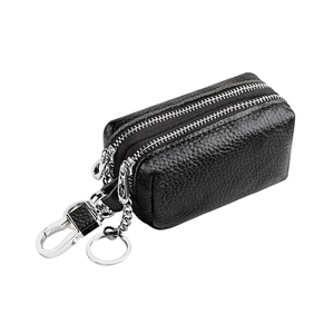 Close-up of double zipper car key case in premium black leather with silver hardware
