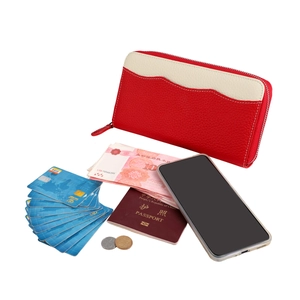 Detailed internal view of RFID leather passport wallet showing large capacity and card slots