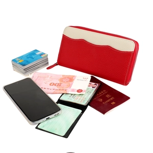 Detailed macro view of large capacity leather wallet showing multi-slot storage for cards
