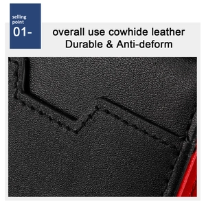 Macro detail of high-quality cowhide leather texture and durable black stitching on wallet