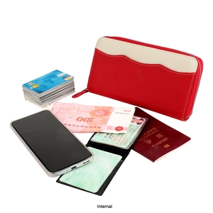 Internal detail showing large capacity leather organizer with RFID protection for passport