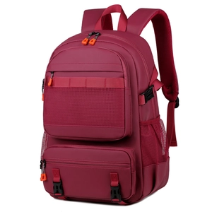Deep red outdoor backpack with multi-pocket design and breathable mesh shoulder straps