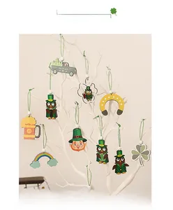 Detail of St. Patrick's Day wooden ornaments featuring Irish shamrocks and lucky truck