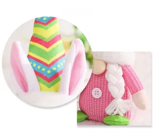 Detail display of a plush Easter gnome featuring knit textures and striped rabbit ears