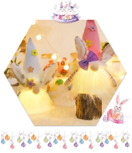 Close-up of lighted Easter gnomes with rabbit ears and flowers on white plush carpet