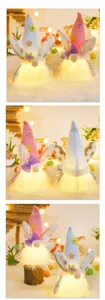 Detail of lighted Easter gnomes with rabbit ears and colorful floral decorations