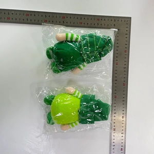 Macro shot of 18cm St. Patrick's Day plush gnomes with green shamrocks in packaging