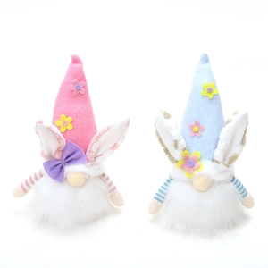 Pair of glowing Easter bunny gnomes with flower hats and white fiber beards decoration