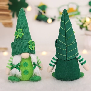 Pair of St. Patrick's Day gnomes with green shamrock hats and striped sleeves decor