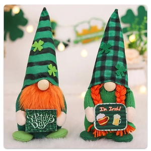 Detail view of St. Patrick's Day gnome plush dolls with green striped hats and shamrocks