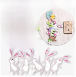 Detail of wooden Easter Spring gnome signs with bunny motifs and slot-in base stands