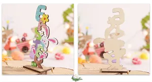 Front and back view of a colorful wooden Easter table ornament with cartoon bunnies