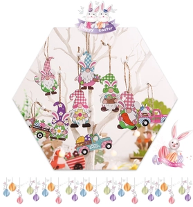 Detailed view of wooden Easter gnomes and bunny truck ornaments hanging on white branches